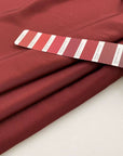 Red fabric of viscose cady and acetate. High quality deadstock.