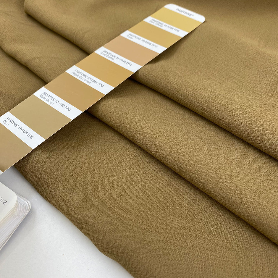 Plain cady stretch viscose in camel color. High-quality deadstock collected in Stock from a Maison de Couture in Italy.