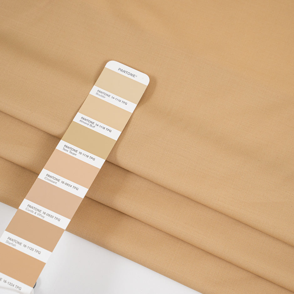 Wool and polyester elasticized camel color soft fabric. High-quality deadstock collected in Stock from a Maison de Couture in Italy.