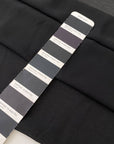 Polyester georgette in black. Very light, soft, and flowy with transparent finish. Ideal for shirting, dresses, and skirts. High-quality deadstock collected in Stock from a Maison de Couture in Italy.
