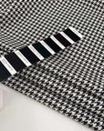 Soft and structured, black and white, viscose and polyamide fabric witha geometric pattern. High quality deadstock fabric.