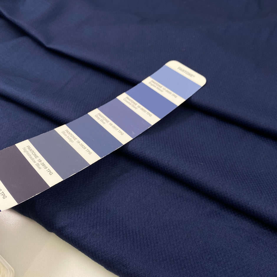 Cottone popeline with texture in medium blue very soft and light. High-quality deadstock fabric by the meter collected in Stock from a Maison de Couture in Italy.