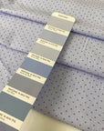 Pure cotton in light blue with a small geometric design, color reference Heather. Very soft and light, not transparent. Ideal for shirting, dresses, or skirts. High-quality deadstock collected in Stock from a Maison de Couture in Italy.