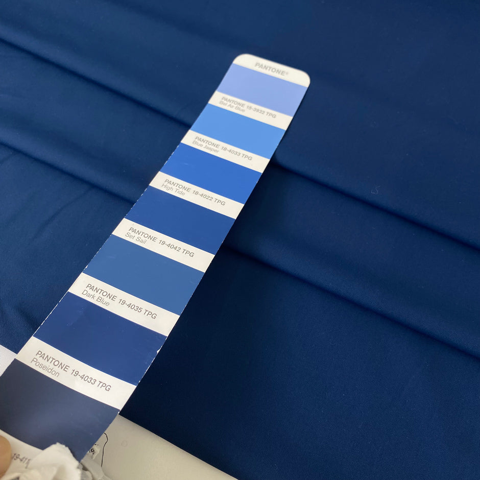 Stretch Lycra fabric in dark blue, very soft and flowy with a smooth hand and no transparency. Perfect for dresses, trousers, skirts, swimwear, and shapewear. High-quality deadstock collected in Stock from a Maison de Couture in Italy.