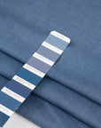 Pure light blue wool with white wires. The fabric is falling and soft. High-quality deadstock fabric collected in Stock from a Maison de Couture in Italy.