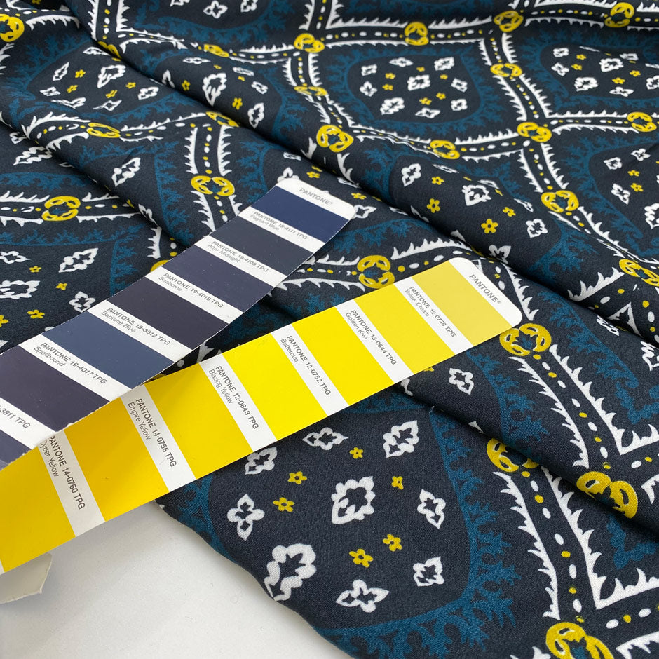 Pure viscose crepe with hypnic design in blue, dark blue, white, and yellow shades. Very soft, light with full coverage and flowy. High-quality deadstock fabric by the meter collected in Stock from a Maison de Couture in Italy.