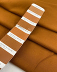 Pure viscose in soft, light and transparent rusty pecan brown. Ideal for blouses, shirts, skirts, and dresses. High-quality deadstock fabric by the meter collected in Stock from a Maison de Couture in Italy.