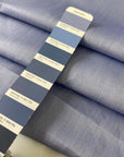 Pure cotton poplin in light blue color reference Eventide. Very soft and light, ideal for shirting, dresses and skirts. High-quality deadstock collected in Stock from a Maison de Couture in Italy.