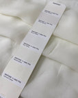 Pure viscose chiffon in white, color reference Marshmallow. Very soft and light, transparent and flowy. Ideal for dresses, skirts, blouses, and shirting. High-quality deadstock collected in Stock from a Maison de Couture in Italy.