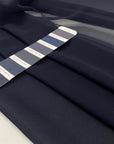 Pure silk chiffon in dark blue. Very light and soft. High-quality deadstock fabric collected in Stock from a Maison de Couture in Italy.