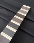Stretch Lycra in dark gray color reference Ebony. Very soft, flowy, and ideal for swimsuits, shapewear, dresses, and skirts. High-quality deadstock collected in Stock from a Maison de Couture in Italy.