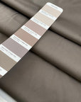 Double-face stretch cotton satin with brindle on one side and taupe gray on the other. Soft, elegant, and structured. Ideal for trousers, skirts, dresses, and light jackets.
High-quality deadstock collected in Stock from a Maison de Couture in Italy.