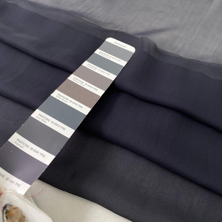 Pure silk chiffon in dark gray, color reference iron gate, very soft, light, and flowy with transparency. Ideal for skirts, skirts, and dresses. High-quality deadstock fabric by the meter collected in Stock from a Maison de Couture in Italy.