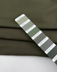 Green bielastic cotton gabardine, ideal for trousers. High-quality deadstock collected in Stock from a Maison de Couture in Italy.
