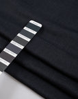 Prince of Wales green Punto Milano polyester, recycled cotton, and polyamide. The fabric is stretchy and falling. High-quality deadstock collected in Stock from a Maison de Couture in Italy.