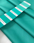 Polyester cady with ottoman texture in aqua green, structured and elegant. Ideal for dresses jackets and tailored pieces. High-quality deadstock collected in Stock from a Maison de Couture in Italy.