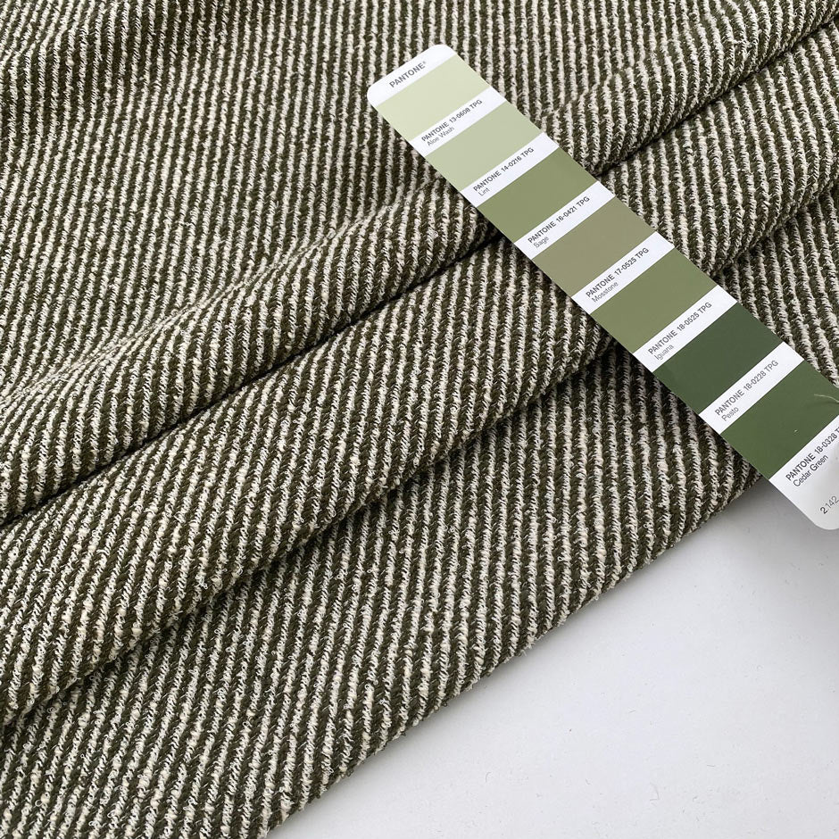 Tweed in a viscose and cotton blend with a soft hand and elegant texture. Ideal for jackets, skirts, and light coats. High-quality deadstock collected in Stock from a Maison de Couture in Italy.