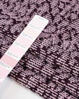 Wisteria purple jacquard textured and stif blended fabric. High quality deadstock fabric.