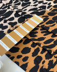 Very soft and stretch jersey with animal print in the shades of ochre and beige. Flowy and not transparent, ideal for dresses, skirts and t-shirts. High-quality deadstock collected in Stock from a Maison de Couture in Italy.