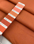 Cotton and linen blend in orange color reference Sunbaked, very soft and not transparent. Ideal for trousers, skirts, dresses, and light summer jackets. High-quality deadstock collected in Stock from a Maison de Couture in Italy.