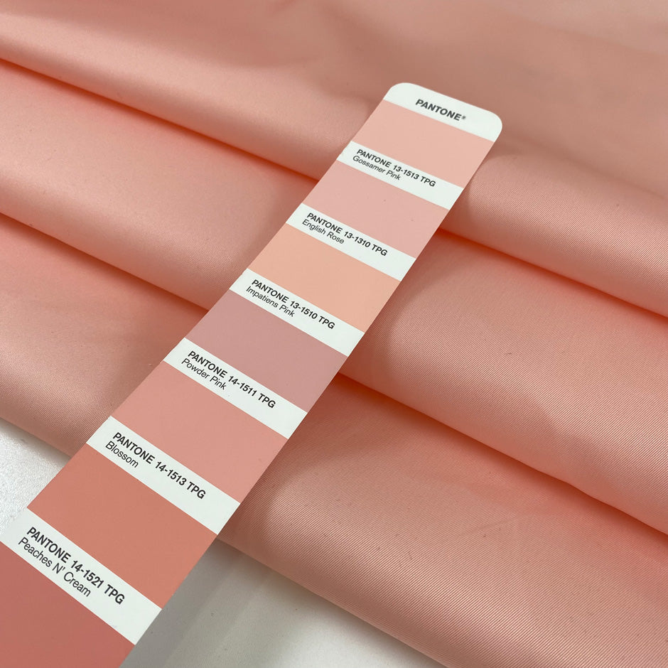 Gabardine nylon peach a little bit shiny and stiff. High-quality deadstock fabric collected in Stock from a Maison de Couture in Italy.