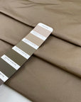 Polyester taffeta with a crunchy hand and opaque finish, ideal for structured garments, linings, and voluminous shapes. High-quality deadstock collected in Stock from a Maison de Couture in Italy.