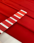Silk and polyester taffeta in racing red. Light, crunchy, and structured. Keeps its shape.Ideal for skirts, dresses, and jackets. High-quality deadstock collected in Stock from a Maison de Couture in Italy.