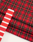 Red, green, yellow and blue mixed plaid wool fabric. High quality deadstock fabric.