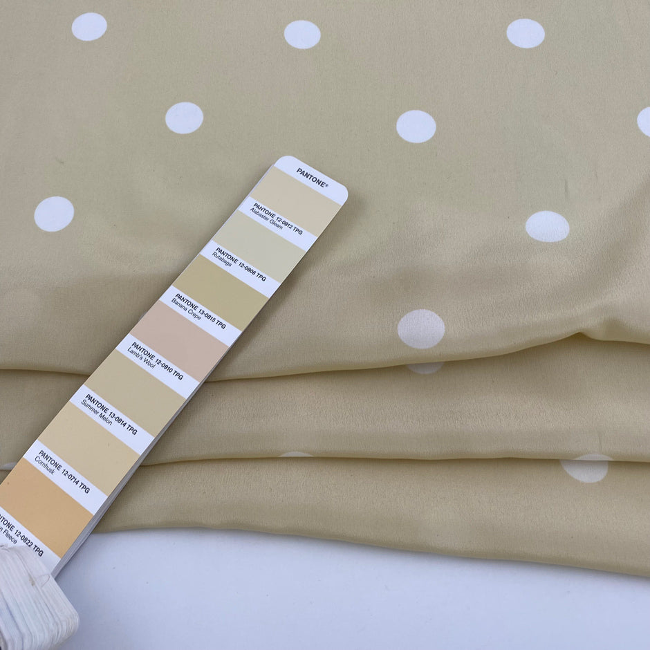 Falling, soft and light polka-dot silk crepe de chine. High quality deadstock fabric.