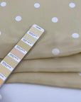 Falling, soft and light polka-dot silk crepe de chine. High quality deadstock fabric.
