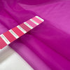 Polyester organza very light and transparent a litlle shiny in bright fuchsia. High-quality deadstock fabric collected in Stock from a Maison de Couture in Italy. Polyester organza very light and transparent a litlle shiny in bright fuchsia. High-quality deadstock fabric collected in Stock from a Maison de Couture in Italy.