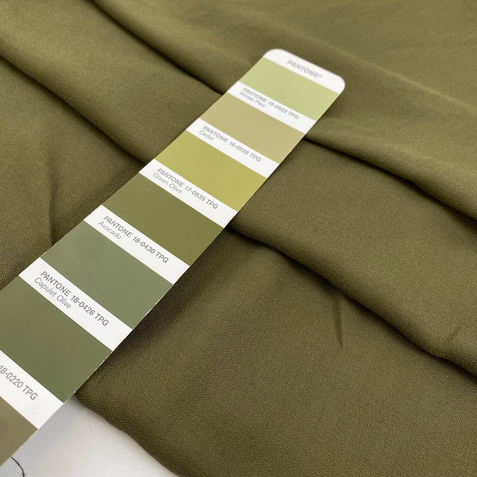 Pure viscose, very soft and light, flowy in avocado green. Ideal for shirts, skirts, dresses, and blouses. High-quality deadstock fabric by the meter collected in Stock from a Maison de Couture in Italy.