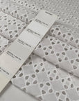 White pure cotton sangallo lace, color reference blanc de blanc, soft and light. A little bit transparent, geometrical design. Ideal for summer dresses, shirtings, blouses and skirts.