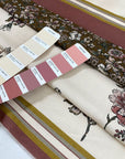 Cotton and elastane with beautiful floral design in panels. Each one is around 70 cm. White, ancient rows and olives green shades.