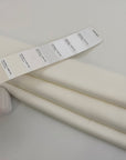 White stretch polyester neoprene. High-quality deadstock fabric collected in Stock from a Maison de Couture in Italy.