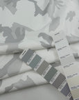 White pure cotton French terry with camouflage print, soft and non-stretch. High-quality deadstock collected in Stock from a Maison de Couture in Italy.