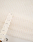 White silk fabric with gold stripes, very light and trasparent. High quality deadstock fabric.