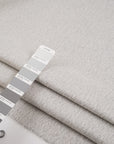 Alpaca and virgin hairy white selvedge wool fabric. High-quality deadstock fabric collected in Stock from a Maison de Couture in Italy.