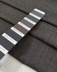 Blended wool and polyester in light gray melange. Very soft and lightweight, not transparent. Ideal for dresses, light jackets, skirts, and trousers. High-quality deadstock collected in Stock from a Maison de Couture in Italy.