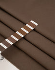Pure soft and structured brown shetland wool. High quality deadstock fabric.