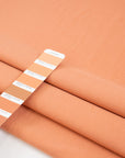 Orange pure wool falling fabric. High-quality deadstock collected in Stock from a Maison de Couture in Italy.