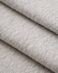 Alpaca and virgin hairy white selvedge wool fabric. High-quality deadstock fabric collected in Stock from a Maison de Couture in Italy.