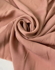 Soft and lightweight pink pure silk georgette. Faintly textured, flowy, and not transparent. Ideal for dresses, skirts, blouses, and shirting.High-quality deadstock collected in Stock from a Maison de Couture in Italy.