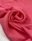 Pure viscose in bright pink, very soft and flowy. Ideal for dresses, shirting, blouses and skirts. High-quality deadstock fabric by the meter collected in Stock from a Maison de Couture in Italy.
