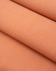 Orange pure wool falling fabric. High-quality deadstock collected in Stock from a Maison de Couture in Italy.