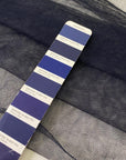 Cotton and polyester tulle in navy blue. Very light and soft, ideal for dresses and skirts. High-quality deadstock collected in Stock from a Maison de Couture in Italy.