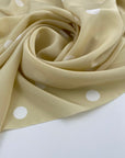 Falling, soft and light polka-dot silk crepe de chine. High quality deadstock fabric.