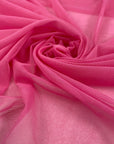 Very light micro tulle and stretchy in fuchsia. Light and transparent, with a very soft and flowy texture. High-quality deadstock fabric by the meter collected in Stock from a Maison de Couture in Italy.