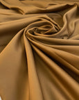 Polyester satin duchesse in tobacco brown, very soft and shiny effect. High-quality deadstock collected in Stock from a Maison de Couture in Italy.