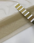 Soft and transparent polyester micro tulle beige. High-quality deadstock fabric collected in Stock from a Maison de Couture in Italy.